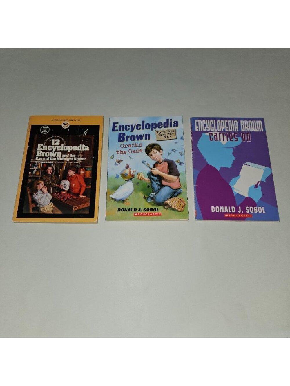 3 Encyclopedia Brown Paperback Book Lot Carries On Cracks Case Midnight Visitor